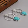 Bengelen kroonluchter etnische zilveren kleur geometrische blauwe stenen oorbel vintage ronde snijpatroon bengelen oorbellen voor vrouwen sieraden