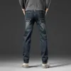 Jeans masculinos menses retro elásticos jeans reta outono/inverno novo retro amarelo lama tingida de jeansl2404