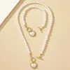 Bijoux de mode Ensemble pour les femmes Collier Bracelet Imitation Pearl Heart Face Pendant Verre Party Gift Ol DS010 240425