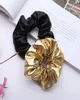 Accessoires de cheveux Pu Scrunchies Black Gold Scrunchie Femmes Elastic Hair Bands Girl Headwear Rubber Ponytail Holder M34361304852