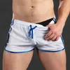 Shorts sportifs à séchage rapide pour hommes d'entraînement de fitness gymnase décontracté en mousse de plage douce respirant pantalon court pantalon 240420