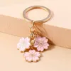 Schlüsselanhänger Lanyards süße Pflanze Schlüsselbund Sakura Blütenschlüssel Ring Emaille Schlüsselketten für Frauen Mädchen Handtaschen Anhänger Auto Schlüsselketten DIY Accessoires