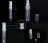 Bouteilles de rangement 30 pack 3 ml / 2 ml Mini flace de pulvérisation en plastique transparent vide atomiseur de parfum mignon pour nettoyer les huiles essentielles de voyage