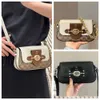 Luxury merk handtassen ontwerper Damestassen Nieuwe damestas Brie onderarm CM064 enkele schouder Crossbody Lock Buckle Pig Pig Nose Handheld Chain