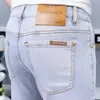 春/夏gevfixch薄いジーンズメンズライトカラースリムフィットエラスティックフィートパンツヨーロッパユースファッション
