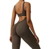 Kvinnors spårningsdräkter Nclagen Womens Backless Sports Jumpsuit Scench Butt Yoga Fleared Pants Set One Piece Gym Set Outdoor Pilates Sports Jumpsuit 240424