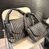 2024 Hoogwaardige Designer Bag Damesschoudertas Tas Tas BB Fashion Clamshell onderarm tas Zacht leer zo zacht als katoenen zomerreizen Duffel Bag Beach Tas