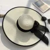 Cappelli larghi cappelli a secchio Big Bowkno Summer Fashion Hat Beach Flat Panama La Casual Brim Str Hat Beach C Black Bow Womens Accessori J240425