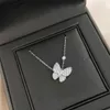 2024 Colliers de trèfle à quatre feuilles classiques Pendants 925 Collier de papillon en diamant complet en argent sterling plaqué avec collier de pendentif CNC à poudre blanche en or 18 carats