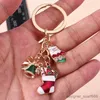 Schlüsselanhänger Lanyards süße Weihnachtsglocken Handschuhe Stiefel Schlüsselanhänger für Autoschlüsselfestgeschenke für Frauen Männer Handtasche Anhänger Keyrings DIY Accessoires