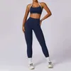 Women's Tracksuits Womens track and field suit yoga set 2PCS sportswear gym workout suit long sleeved gym cut top waist fitness bra sportswear 240424