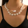 Choker Special-vormige zelfafscheidende dubbele barokke parels ketting 2024 Trend voor vrouwen luxe hoogwaardige strandjuwelencadeau