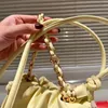 Bolsa feminina de moda nova bolsa de cordeiro de cordão francês de luxo de couro genuíno francês Bolsa plissada saco de mão versátil de luxo de luxo crossbody