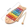 Barn träfiskform som knackar musikalisk pedagogisk xylofoninstrument Barn som lär utbildningsmultifunktionsleksaker