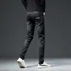 Brand Trendy Autumn e Winter Black Jeans Mens Slim Fit Pantaloni elastici piccoli