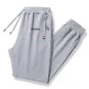 Pantaloni pantaloni da golf maschile malbon pantaloni di cotone pantaloni sciolti da corsa uomini a maglia pantaloni alla caviglia seccati di grandi dimensioni pantaloni lunghi