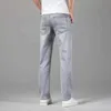 Jeans masculin Summer Mens Mens Elastic Cotton Jeans en denim doux et gris Business ultra-mince pantalon décontracté de haute qualité trantsl2404 de haute qualité