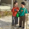 Boutique Childrens Portez des tas de dessins animés Vêtements pour enfants Tshirt coréen Style Loose Tops T-Shirts Crewneck Girls Courte
