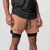 Mäns shorts nya män shorts sport fitness 2-i-1 snabbtorkande andningssträcka dubbelskikt shorts joggers gym körträning byxor d240426