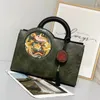 Aufbewahrungstaschen Retro Leder Zwei Phonixes Muster Handtasche Ethnische Cowhine bestickt modische Temperament Chinesische Weibchen -Tasche