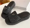 Designer Slippers P family thick soled woven flip flops new summer grass woven sponge cake sole sandals for women to wear externally