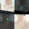 Eili Tattoo Transfer Blue Luminous Glow Tattoo Sticker Waterdichte tijdelijke vinger pols Body Art False Butterfly Tattoo For Music Festival Party 240426