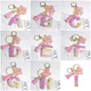 Keychains Lanyards Söt harts A-Z Initialer Letter Keychain Pink Sparkle Farterfly Tassel Pendant Keyring For Women Girl Purse Handväskor smycken gåva