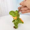 Nouveau mignon mini Tyrannosaurus rex sac de trèfle pendentif dessin animé dinosaure peluche poupée