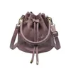 Lyxdesigner Miozj Bucket Bag Nisch Design för kvinnor 2024 Ny fashionabla och mångsidiga bokstäver axel casual trendig crossbody handväska