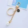 Kechankains Lonyards imitation tendance coeur perle kechaine mignon n ° 5 pendentif pour femmes pour filles case clés de la chaîne de clés accessoires