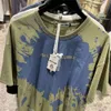 Trendiga herrkläder par kollektion sommar grafisk skjorta ny produkt lös tryck rund hals tshirts för män