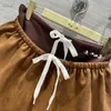 Designer di gonne Nanyou 2024 Primavera/estate Nuovo design alla moda e dolce e dolce Design a due pezzi con elastico in vita corto Deer Skin Skin Skirt Z27x