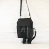 Rucksack hochwertiger Metallschnalle Black Nylon Crossbody Bag Fashion Mini -Kordel für Mann und Frauen