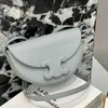 Women Retro Original Cellin Designer Bags New Saddle Bag Leather Half Round Moon Bag Fashion Crossbody Crossbody Womens ذات الشعار الأصلي عالي الجودة