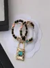 23SS Luxury Brand Designer Lettres Broches Vintage Small Sweet Wind Gold plaqué Brooch Pin Crystal Crystal Pearl Bijoux Fashion ACC5895378