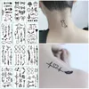 Tatuaż transfer 12PCS Mała planeta geometryczna Tymczasowe naklejki na tatuaż Czarny transfer wody Tatuaż Minimalistyczny Słońce Księżyc Projekt Fake Tattoo Women 240426