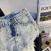 Koreaanse zomerse high taille met dames Koreaanse zomerse taille single breasted a-line jeans shorts shorts tassel raw rand denim shorts voor vrouwen y240425