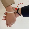 Perlé 2 morceaux de bracelets magnétiques couple verrouillage du bracelet en forme de cœur Amitié corde à tressage réglable