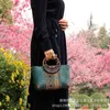 Style Stroh Bag gewebte weibliche Tasche Thailand Rattan Bag Stroh gewebte Tasche Freizeit Urlaub Handtasche kleine Tasche 240415
