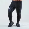 Pantalones de acondicionamiento físico de Lyft para hombres otoñales e invierno.