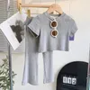 衣料品セット夏3〜9歳の子供の女の子セットカジュアルスタイルの短袖Tシャツトップ+マイクロフレアロングパンツキッズトラックスーツ2PCS衣装セット