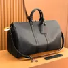 Kvinna Luxury Large 45 50 55 Duffle Påsar för man Fashion Crossbody Tote 10A Designer Bag Dhgate Handväska Pochette Trunk Axelväska Travläder Koppling Bagagväskor