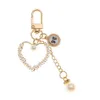 Kechankains Lonyards imitation tendance coeur perle kechaine mignon n ° 5 pendentif pour femmes pour filles case clés de la chaîne de clés accessoires