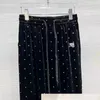 Pantalon féminin 2024 automne / hiver Design Velvet Diamond Wide jambe à la mode et mince pantalon polyvalent