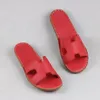 Slippers Cowhide Flat Sandales pour femmes chaussures d'été en cuir plage douce et saine