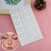 Tatueringsöverföring 3d ansiktsmycken kristall diamant tatuering klistermärken diy kvinnor ögon målla kropp rosa hjärta pärla strass 3d makeup konst steg 240426