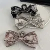 Klemmen stof boog haarpin temperament elegante vrouwen haar klauw clips prinses hoofdtooi mode mode grote grijp clip vrouw haar accessoires y240425