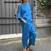 Kvinnors tvåbitar byxor Summer Casual Loose Two Piece Set Women Fashiona Solid Color Cotton Linen Tshirt Wide Leg Pants Two Piece Set Women Y240426