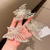 Klemmen voortreffelijke strass Butterfly Hair Claw -clips voor vrouwen Elegant Pearl Hair Crab Barret Hoofddeksels Haarclip paardenstaartclip Y240425