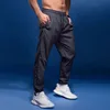 Bintuoshi Sport Pants Мужчины, бегущие с застежкой -застежкой для футбольных спортивных брюк, брюки бегут по фитнесу штаны 240412